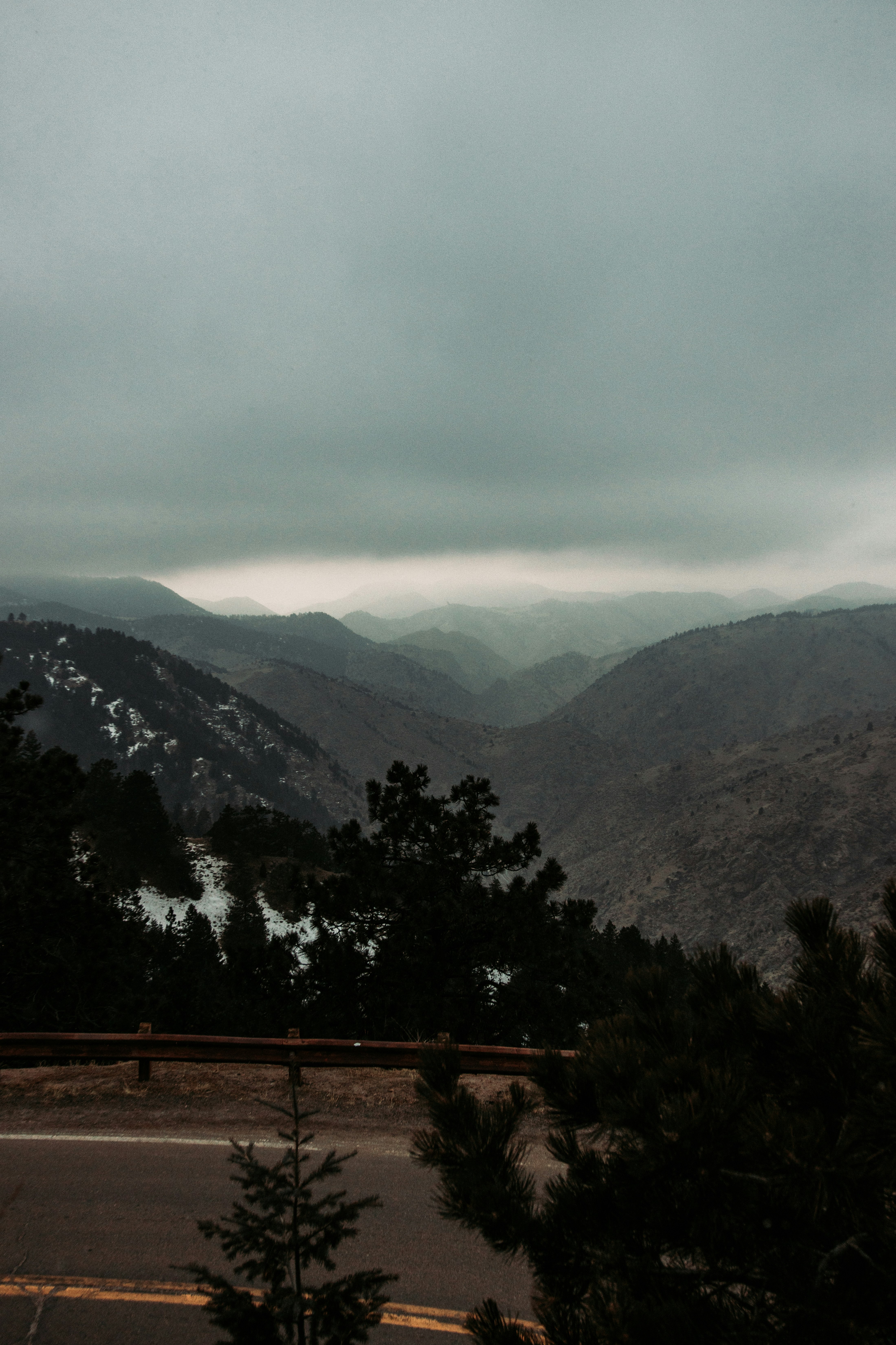 green trees near mountain during daytime